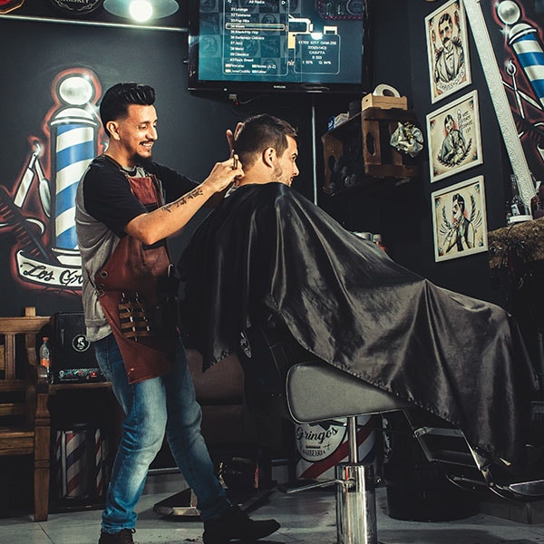 Barber Cutting Hair Using Mobile Payment | VMS
