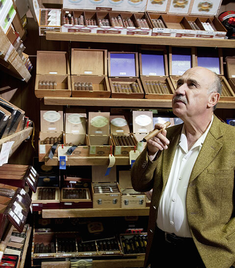 Man staring at cigars